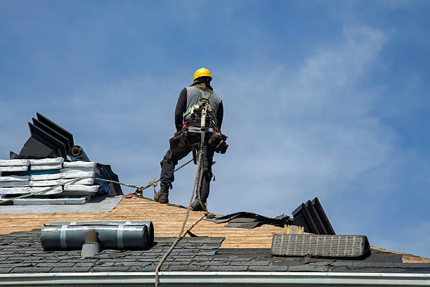 Professional Roof Replacement technician working in Freetown, IN